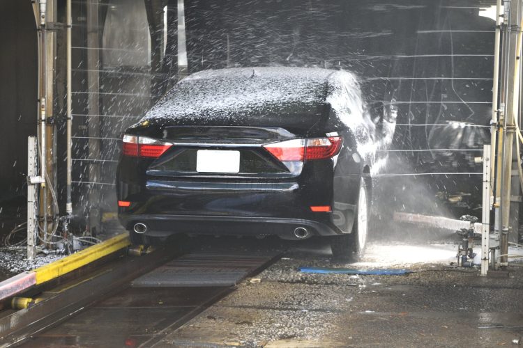 car being washed by a car washing machine